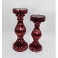 red colored large glass candlestick holder